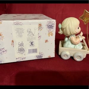 Precious Moments Wishing you a world of peace.